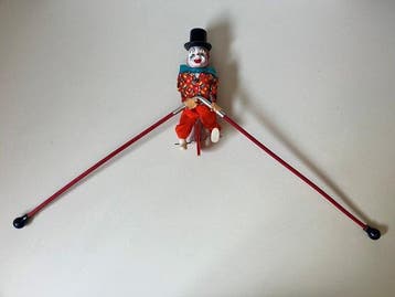 FECO - Blikken speelgoedfiguur - Circus clown op eenwieler -