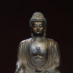 A fine antique brass statue of Amitabha Buddha, from a