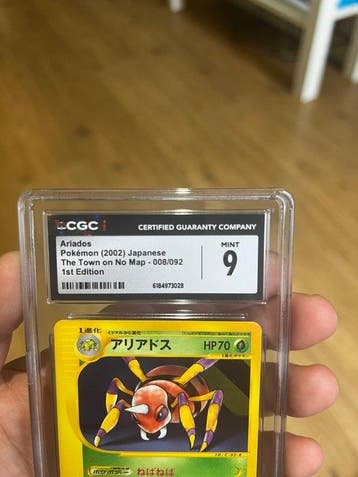Pokémon - 1 Graded card - Ariados 008/092 First edition,, Hobby en Vrije tijd, Verzamelkaartspellen | Pokémon, Nieuw