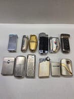 Sans prix de réserve - Briquet - métal et autres - (19)