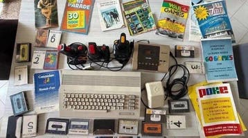 Commodore 64 with games and accessories - Computer