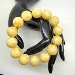 Armband met witte Baltische barnsteen kralen van 15 mm, 27,2