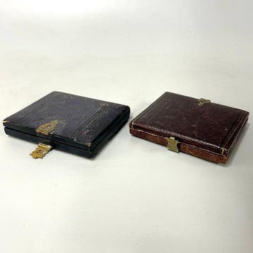 Two antique leather cased photographs with an antique
