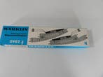 Schaal H0 Märklin 2167 electromagnetisch paar meegebogen..., Ophalen of Verzenden, Rails