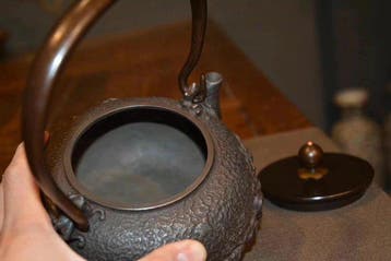 Cast Iron Teapot – Japanese Landscape and Pavilion Relief