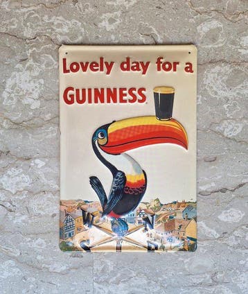 Guinness - Guinness-toekan - John Gilroy - Reclamebord -