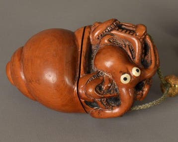 Antieke Japanse houten tabakscontainer met octopus – netsuke