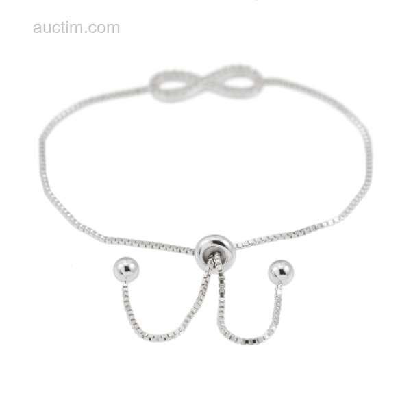 Witte armband met infinity symbool rond gezet met., Handtassen en Accessoires, Overige Accessoires, Ophalen