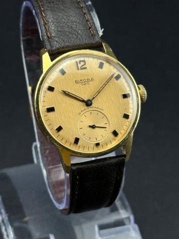 Bifora - 120 Gold Textured Linen Dial - Zonder minimumprijs