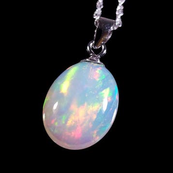 Geen Reserve – 5,25 ct oval Ethiopische opaal met helder