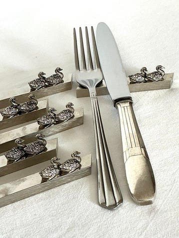 bestekleggers met gleufjes voor naamkaartjes - Messensteun