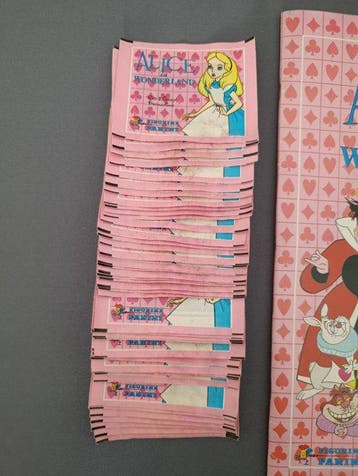 1984 Panini Alice in Wonderland Empty album & 50 sealed, Collections