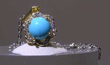 Turquoise Halsketting - Hoogte: 19 mm - Breedte: 9 mm- 2.26