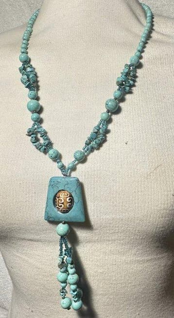 Gestabiliseerde turkoois met Tibetaans Dzi-amulet Rustige