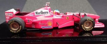 Minichamps 1:43 - Model raceauto - Ferrari F310B - G.P., Hobby en Vrije tijd, Nieuw